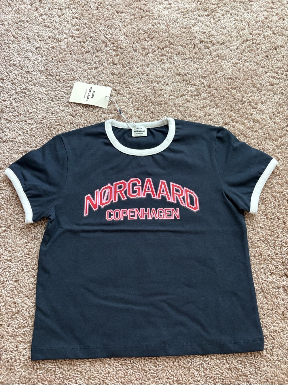 Mads Norgaard Navy Tee with Red/Pink Logo and White Trim